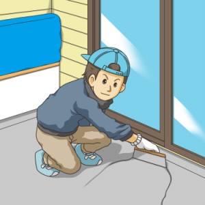 ウレタンをヘラで広げる職人